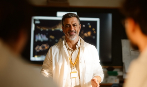 man explaining in a meeting